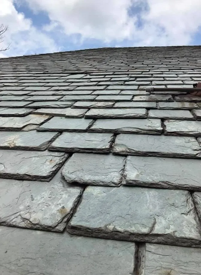 Slide of Melita Roofing