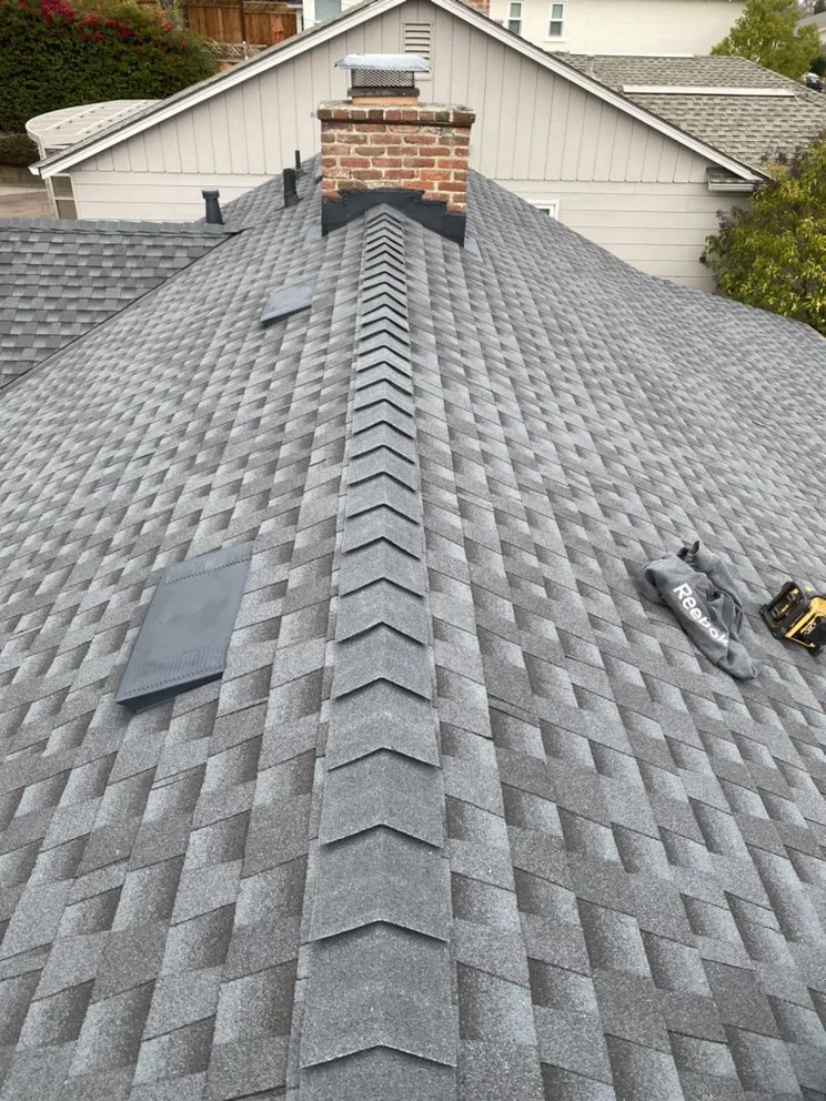 Slide of Mel's Roofing