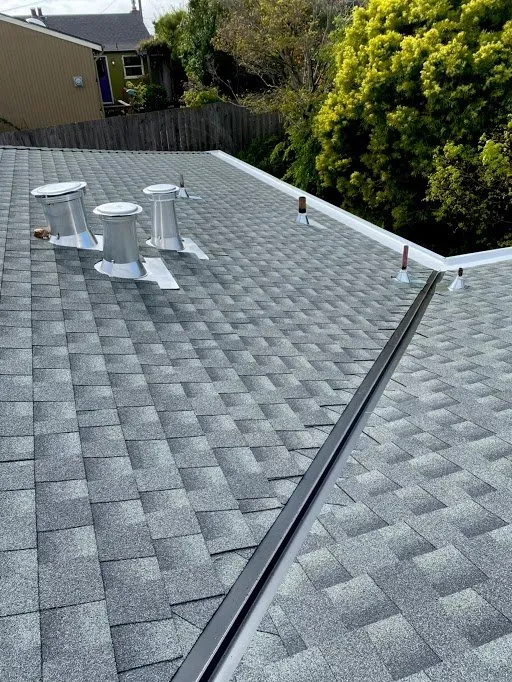 Slide of Mel's Roofing