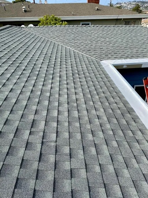 Slide of Mel's Roofing