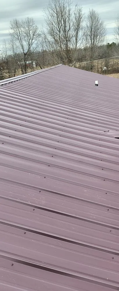 Slide of Melvin & Selvin Metal Roof