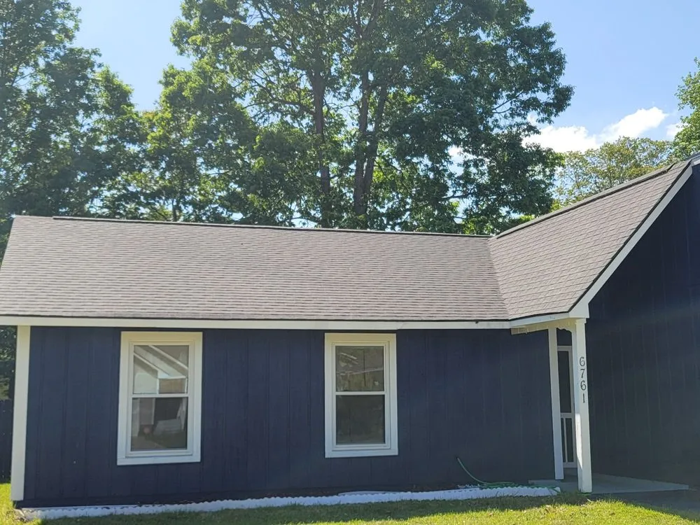 Slide of Melvin's Roofing