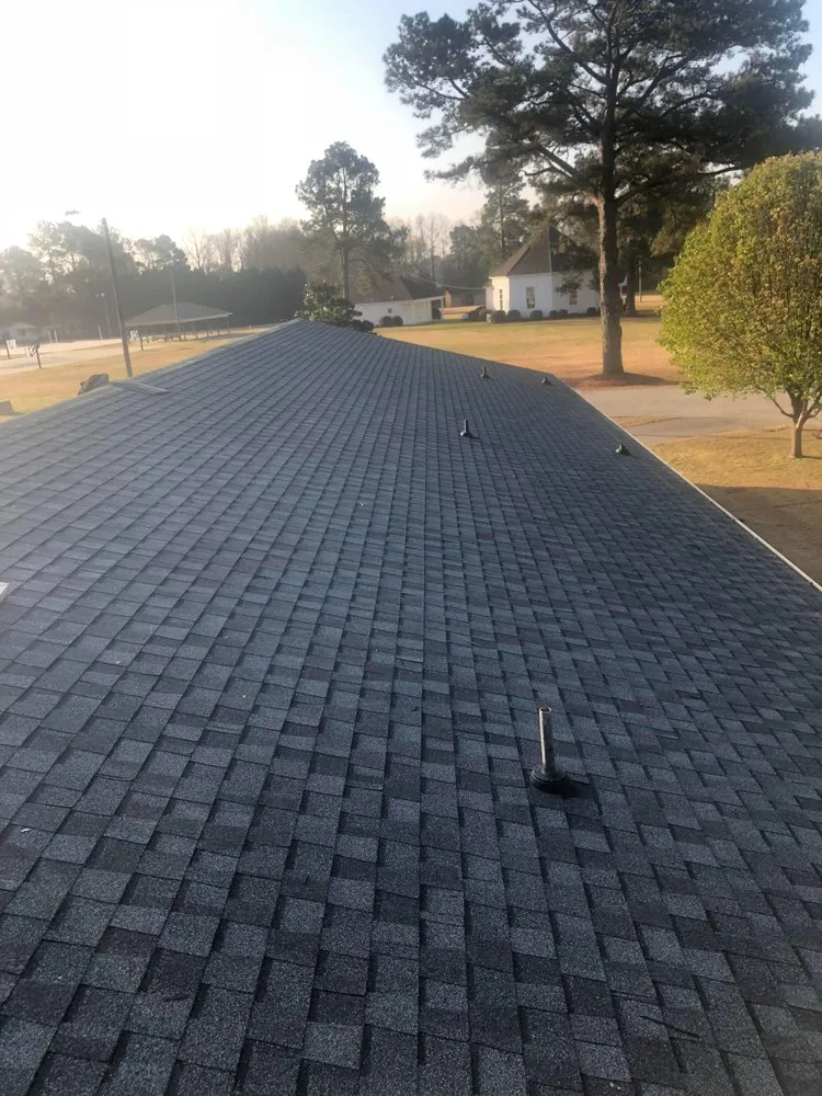 Slide of Melvin's Roofing