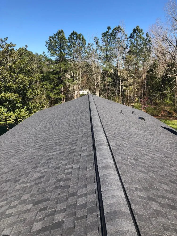 Slide of Melvin's Roofing