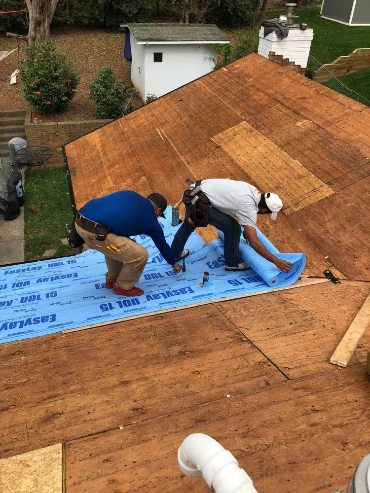 Slide of Melvin's Roofing