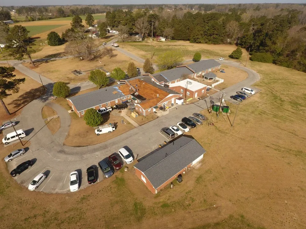 Slide of Melvin's Roofing