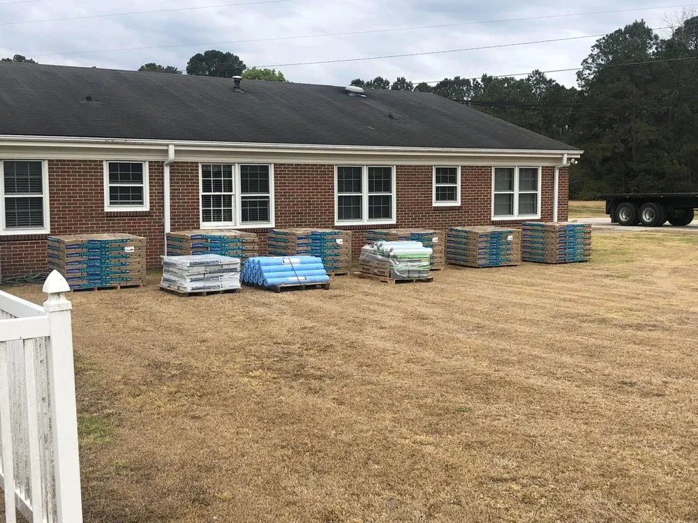 Slide of Melvin's Roofing