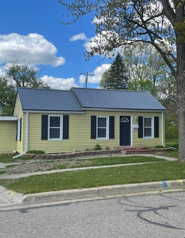 Slide of Men at Work Contractors & Roofing