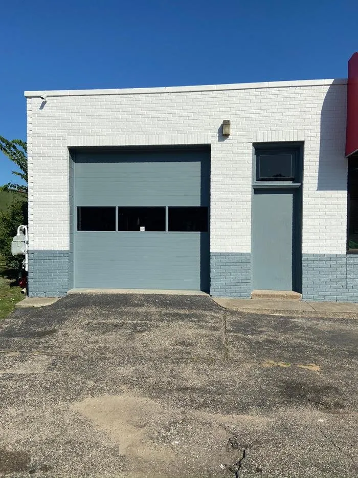 Slide of Men at Work Contractors & Roofing