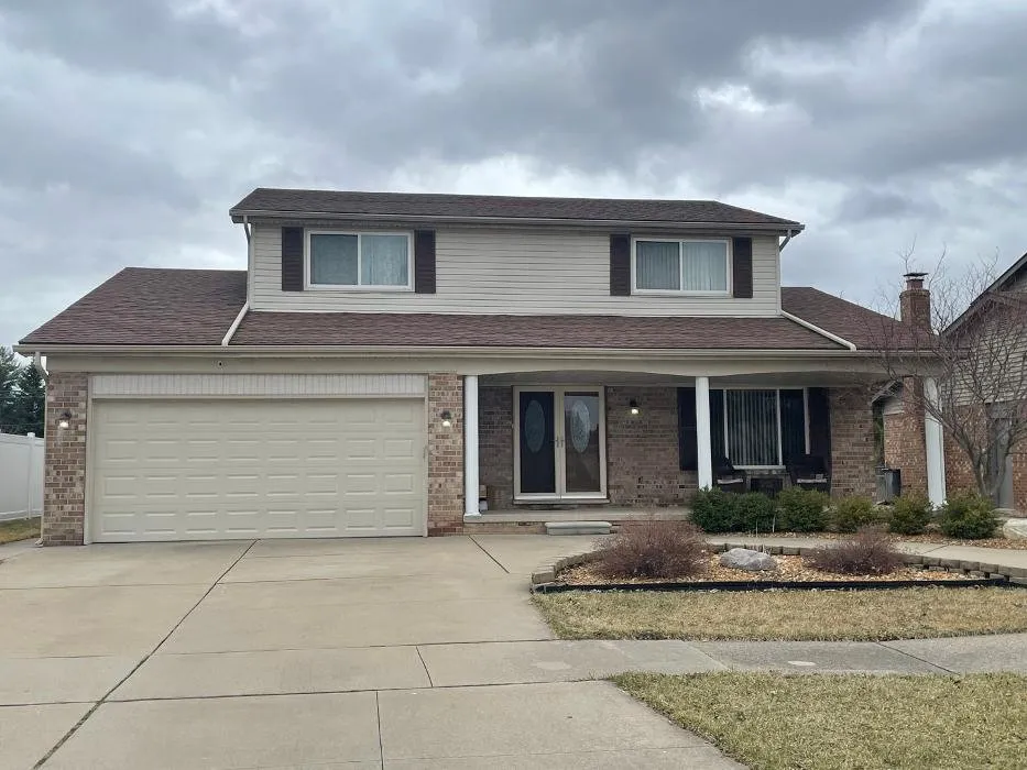 Slide of Men at Work Contractors & Roofing