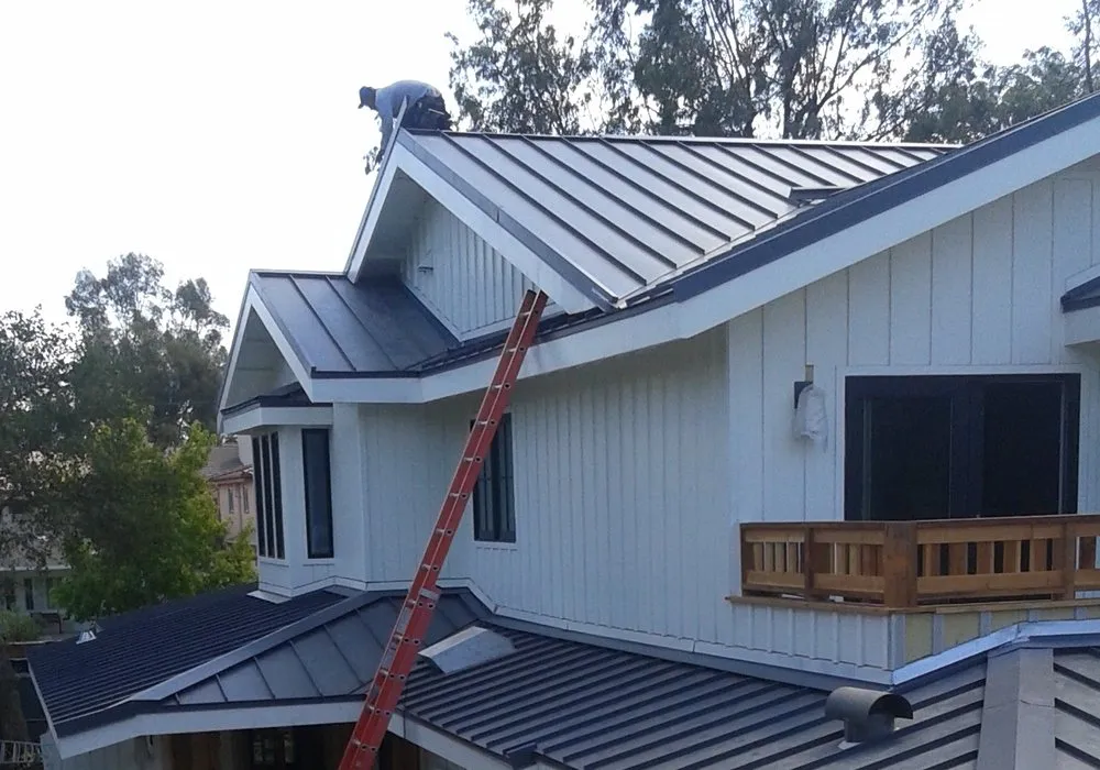 Slide of Mena Roofing