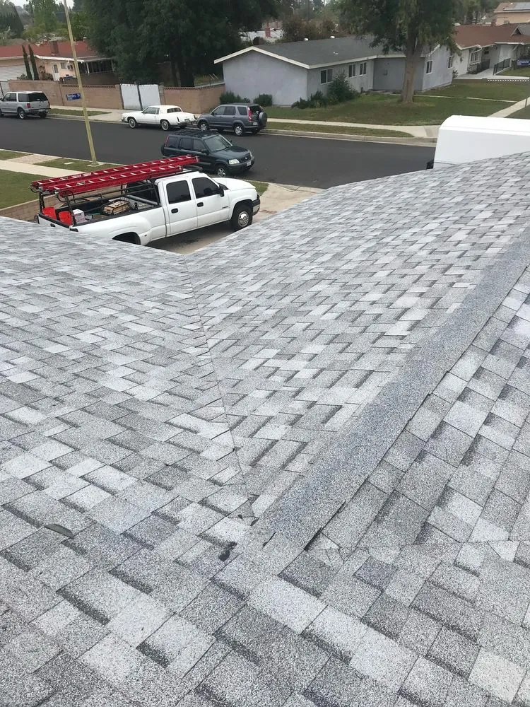 Slide of Mencho's Roofing & Repairs