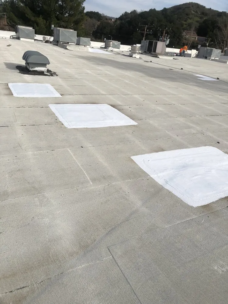 Slide of Mencho's Roofing & Repairs