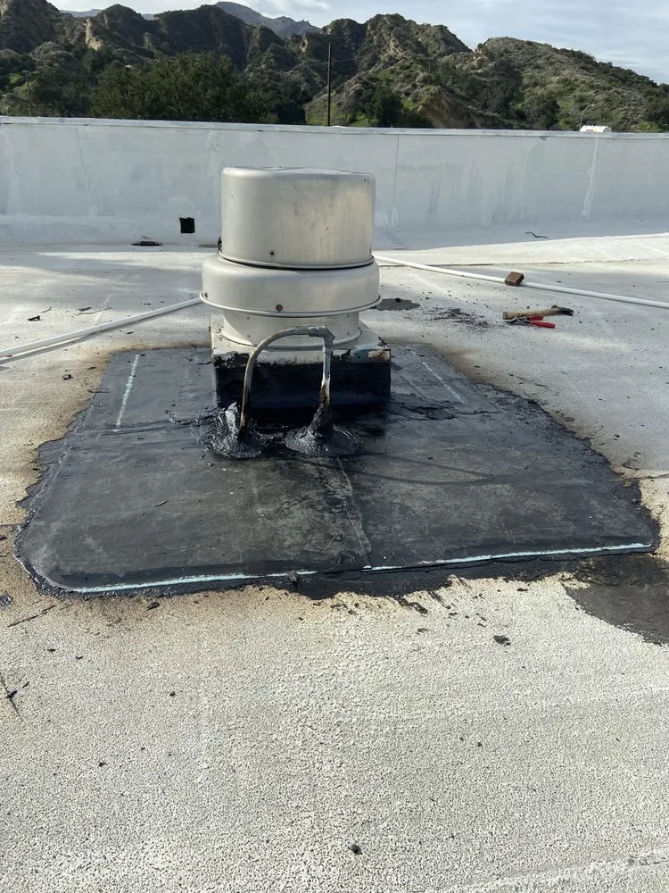 Slide of Mencho's Roofing & Repairs