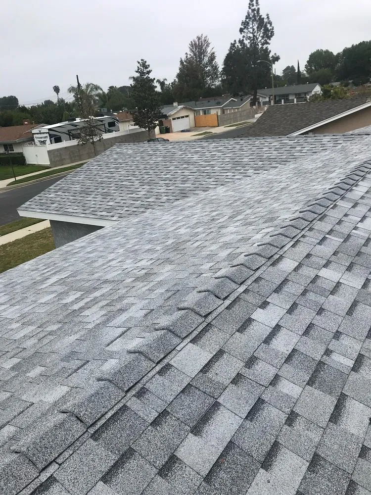 Slide of Mencho's Roofing & Repairs