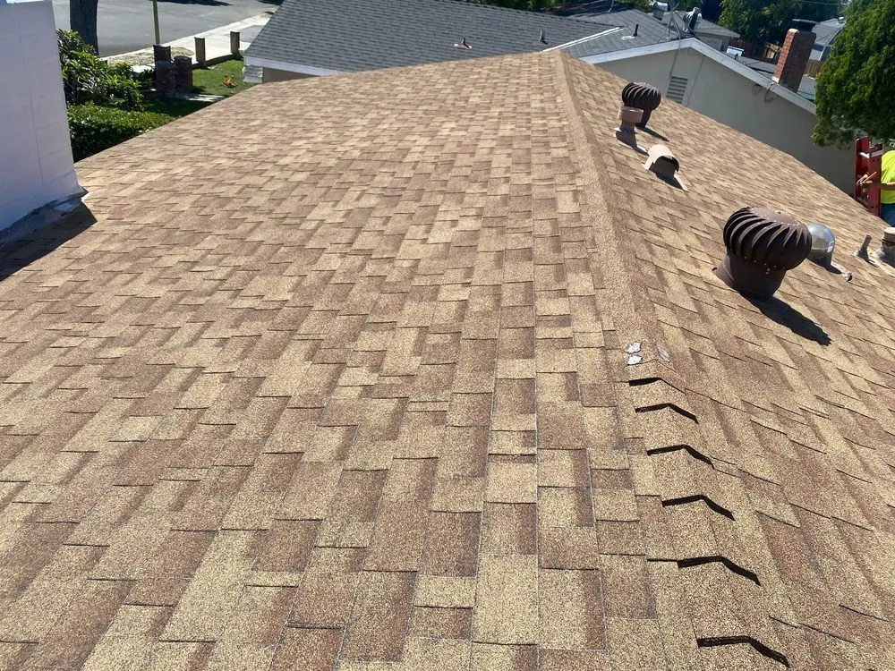 Slide of Mencho's Roofing & Repairs