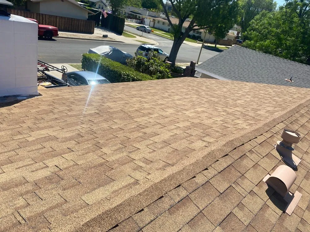 Slide of Mencho's Roofing & Repairs