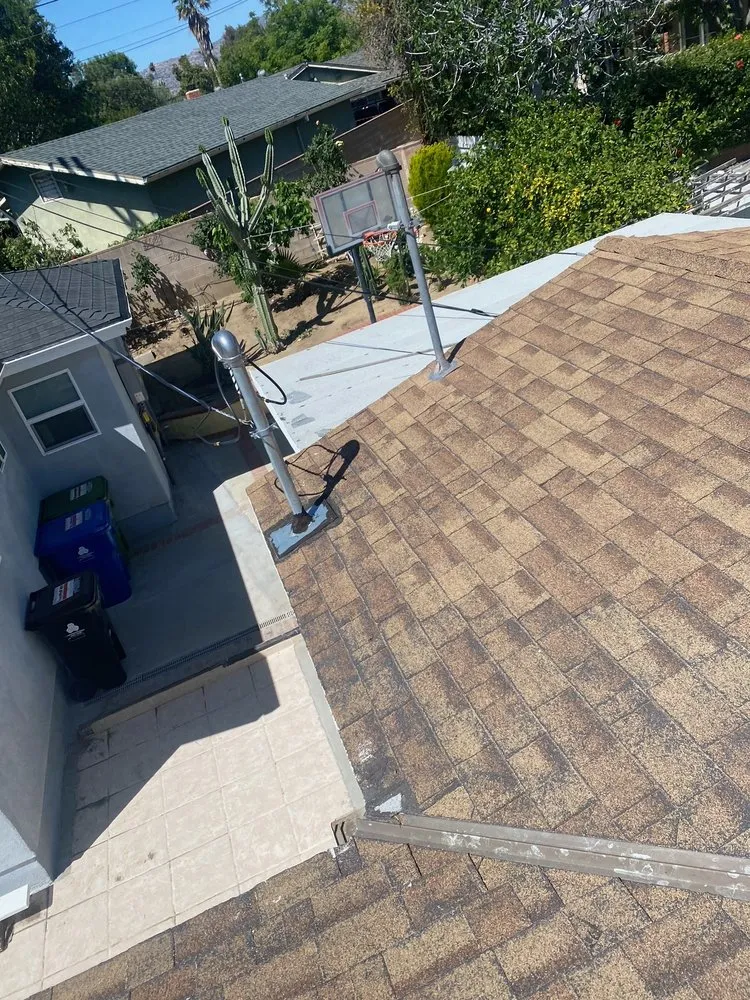 Slide of Mencho's Roofing & Repairs