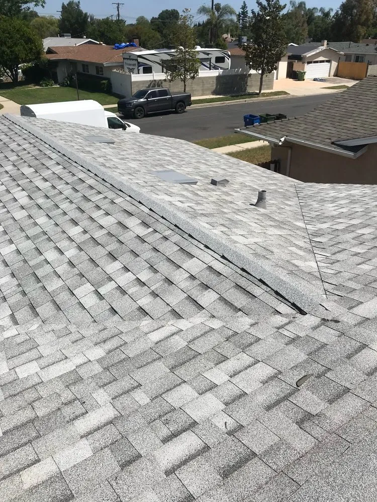 Slide of Mencho's Roofing & Repairs