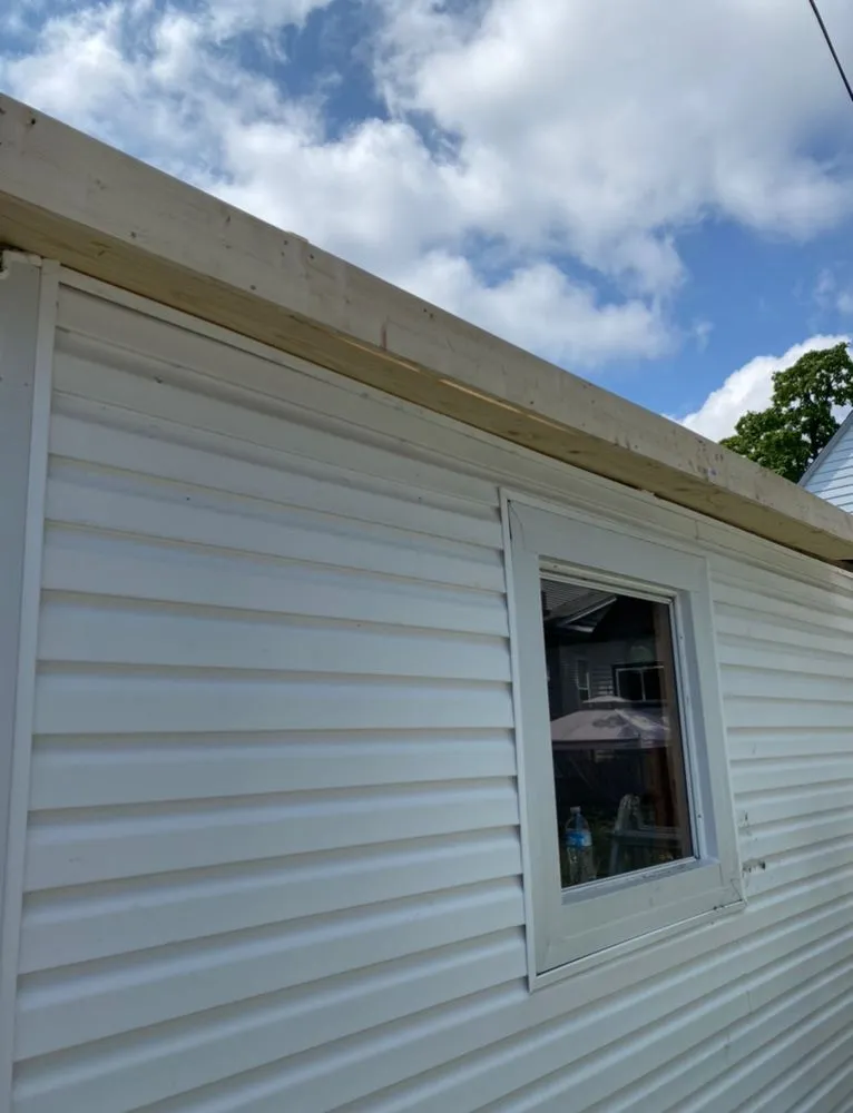 Slide of Mendes Roofing Contractors