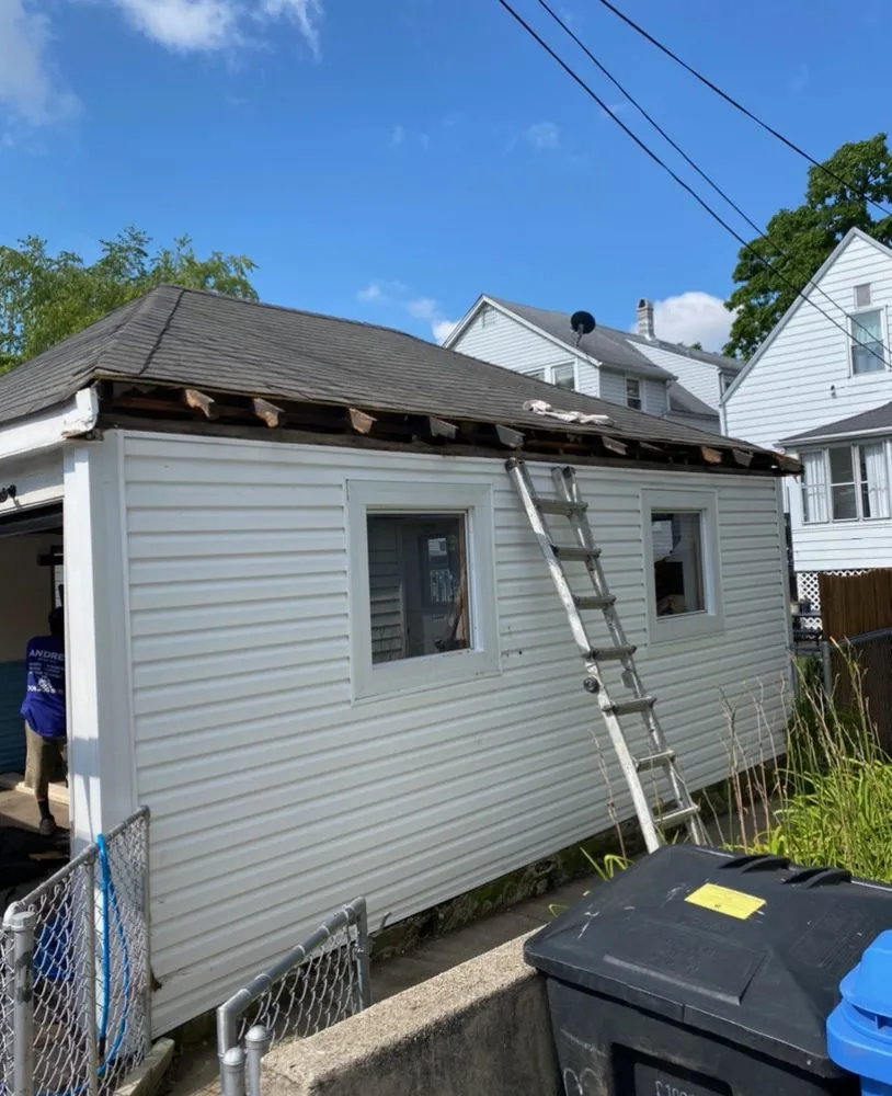 Slide of Mendes Roofing Contractors