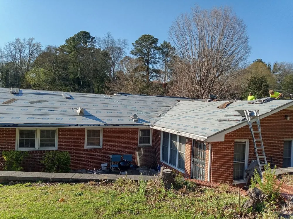 Slide of Mendez Roofing