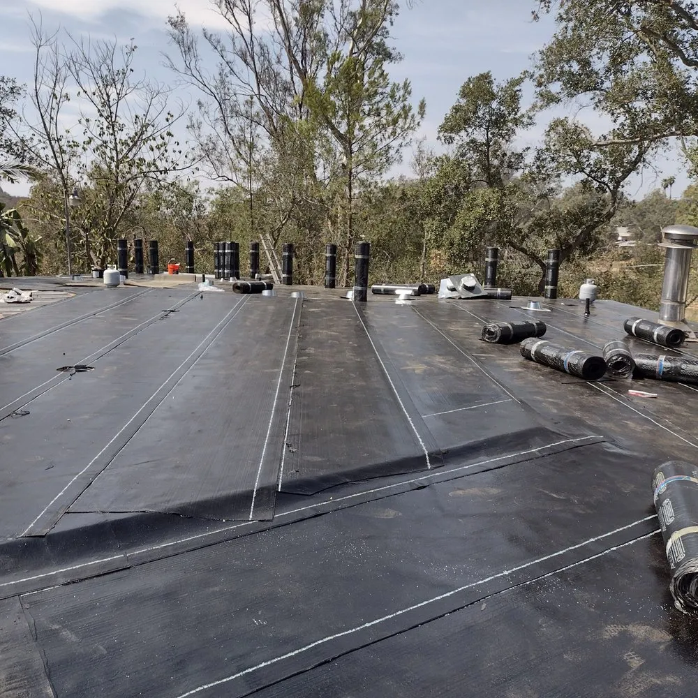 Slide of Mendez roofing