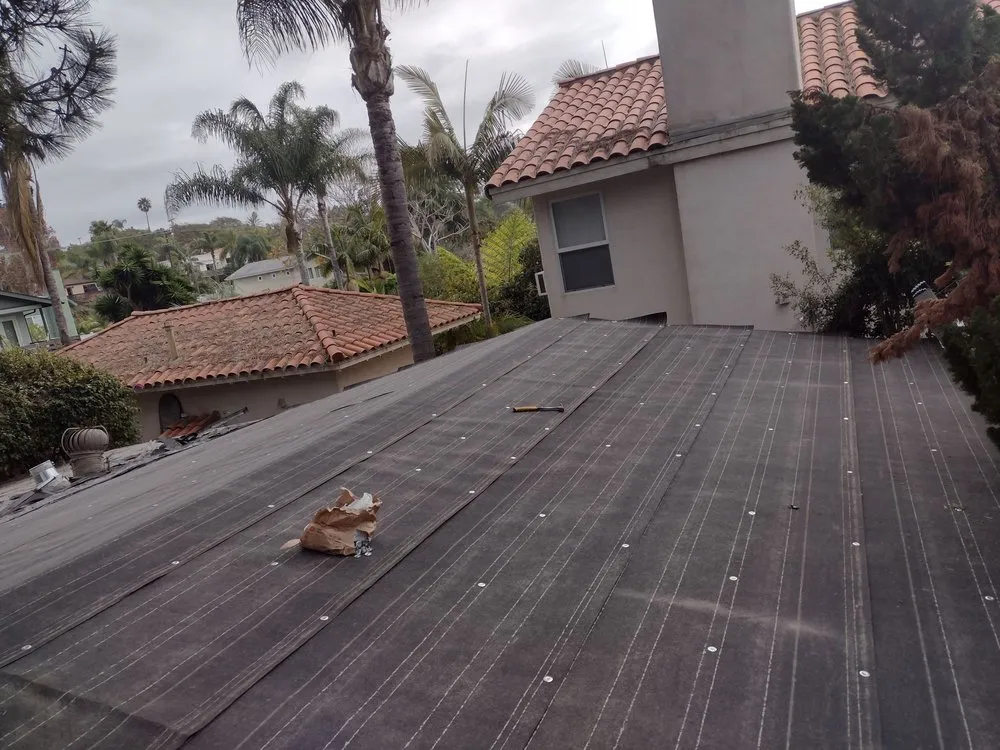 Slide of Mendez roofing