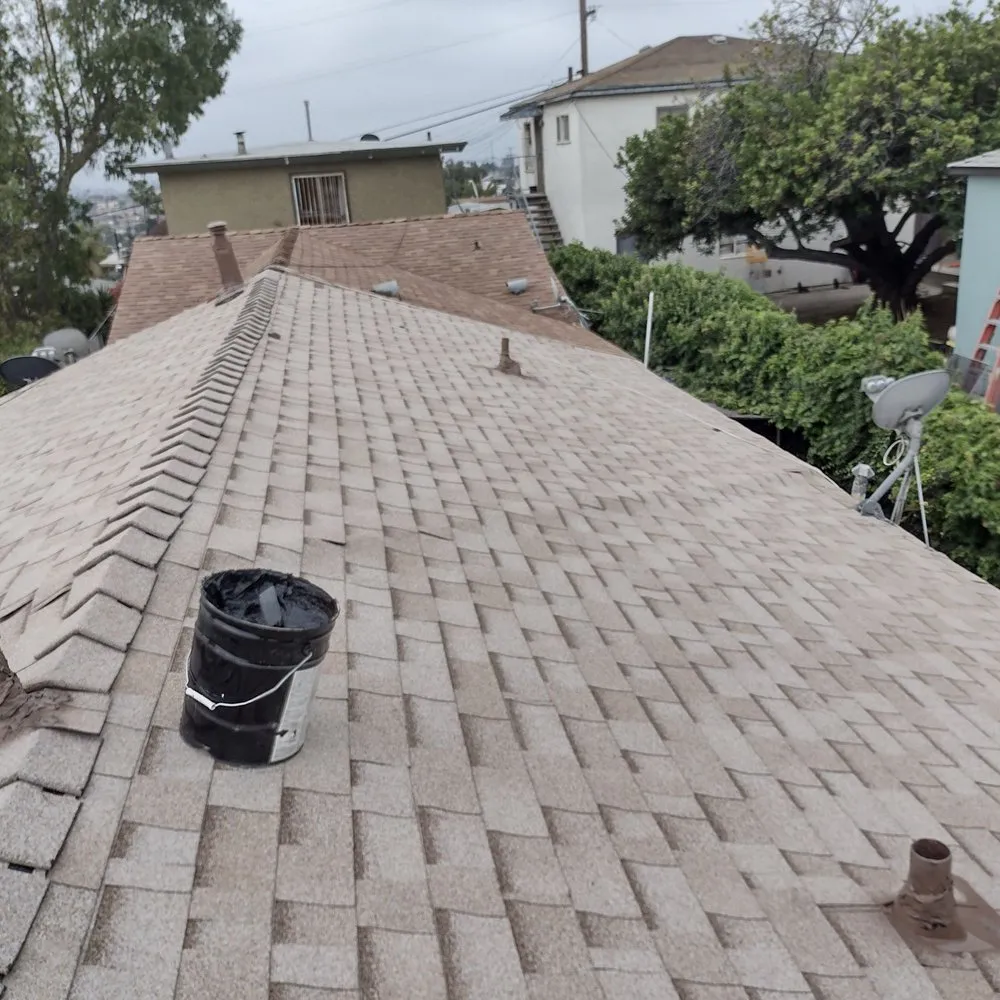 Slide of Mendez roofing