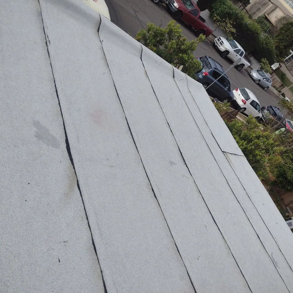 Slide of Mendez roofing