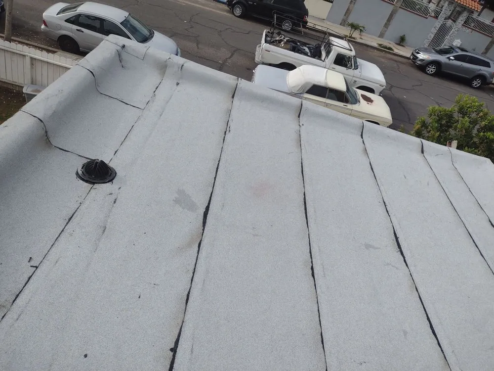 Slide of Mendez roofing