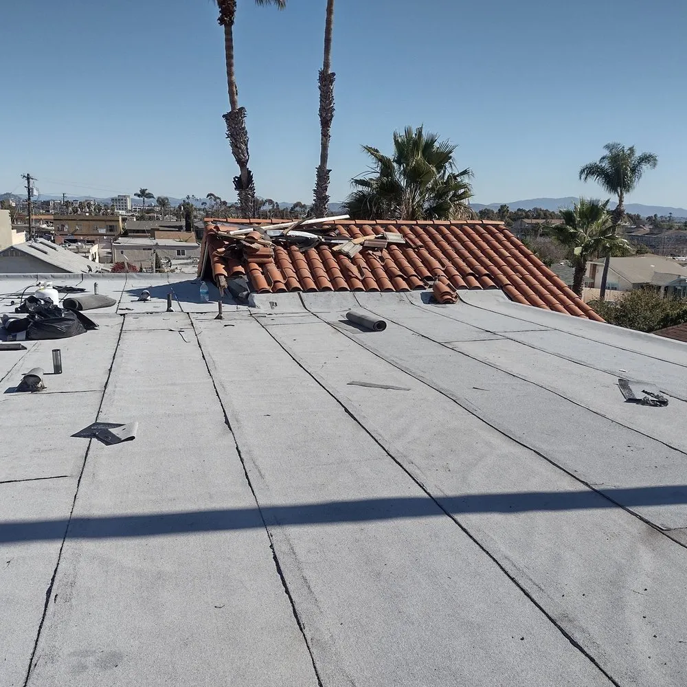 Slide of Mendez roofing