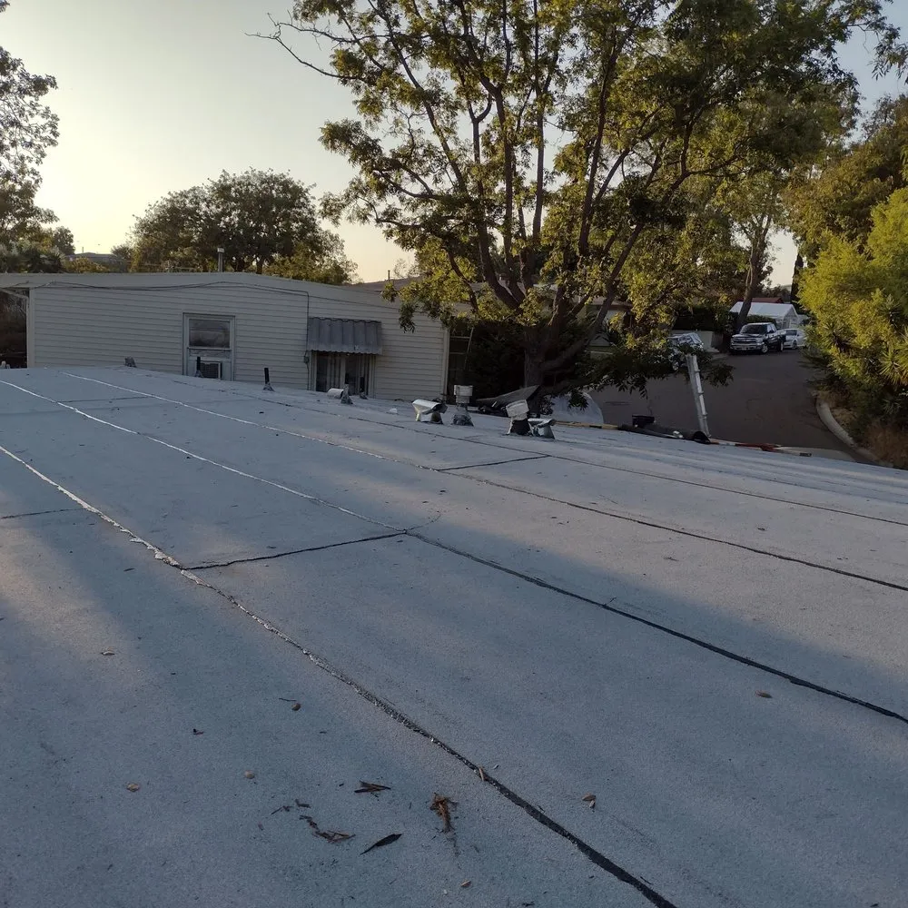 Slide of Mendez roofing