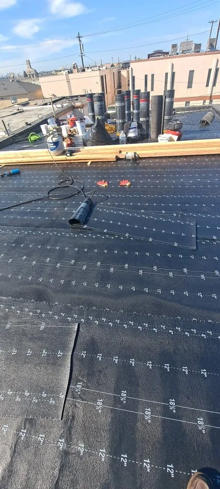 Slide of Mendoza & M  Roofing