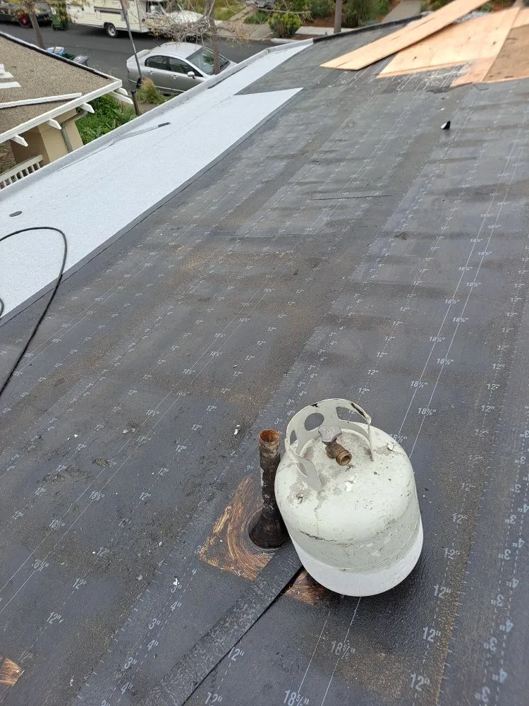 Slide of Mendoza & M  Roofing