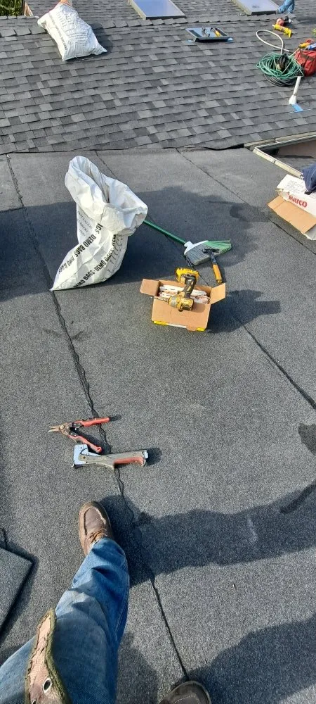 Slide of Mendoza & M  Roofing