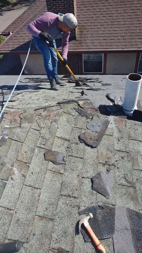 Slide of Menny Roofing