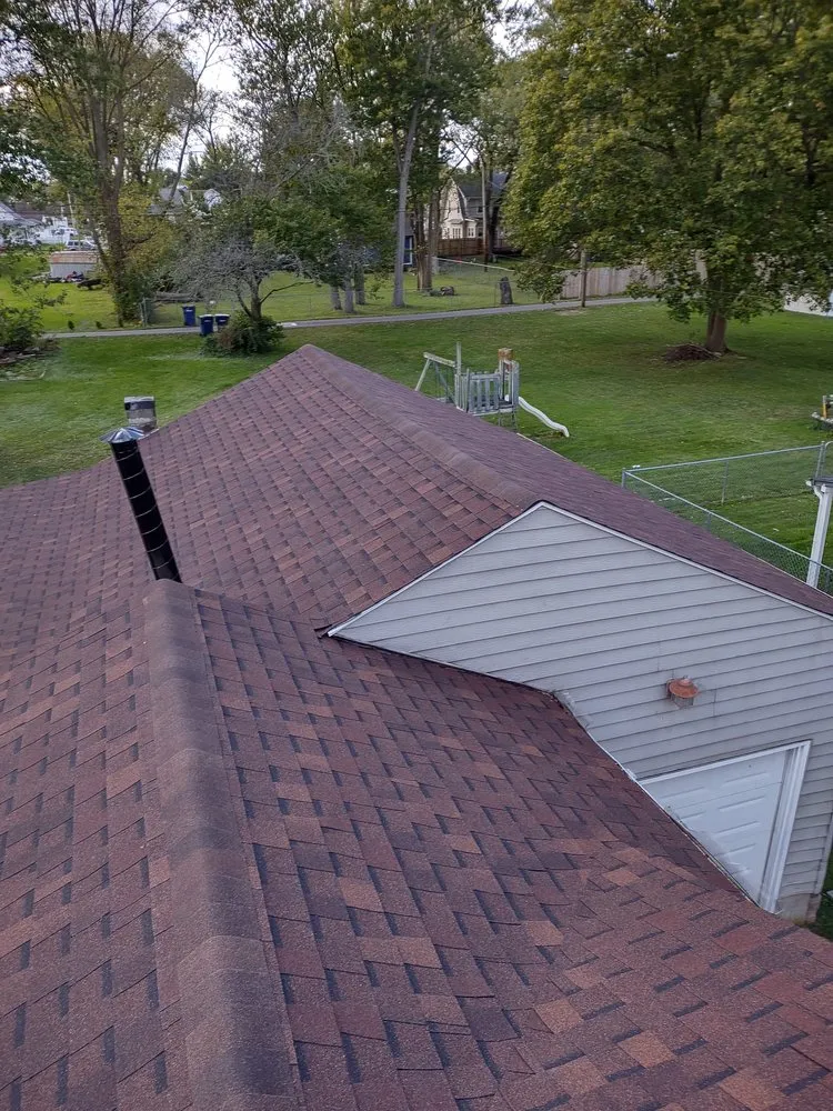 Slide of Menny Roofing