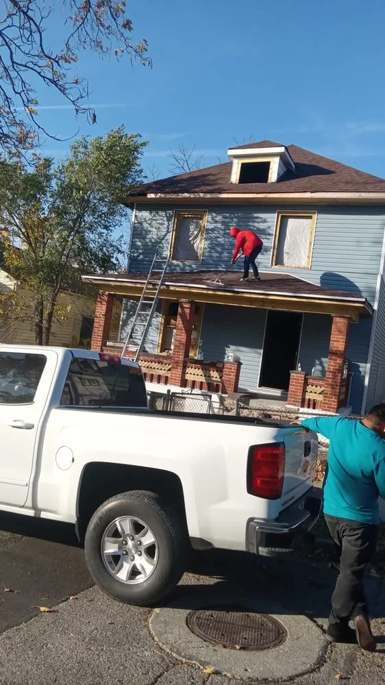 Slide of Menny Roofing