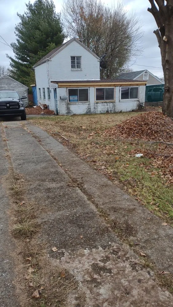 Slide of Menny Roofing