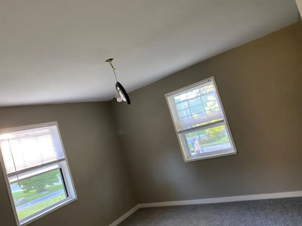 Slide of Menny Roofing