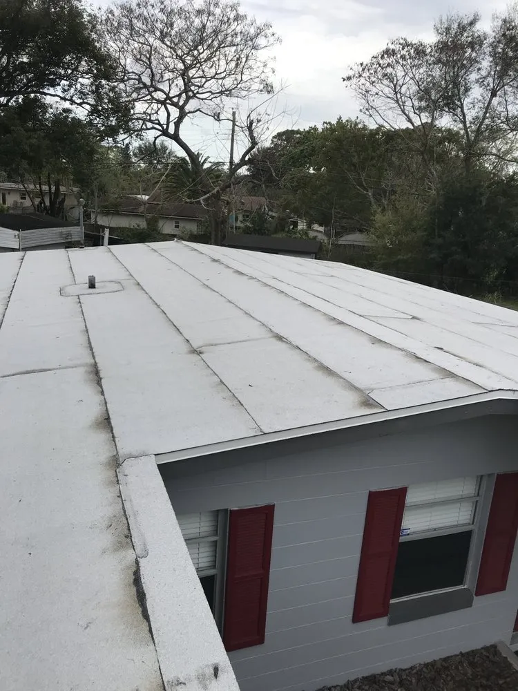 Slide of Menzel Roofing Services