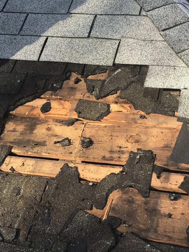 Slide of Mercedes Roofing