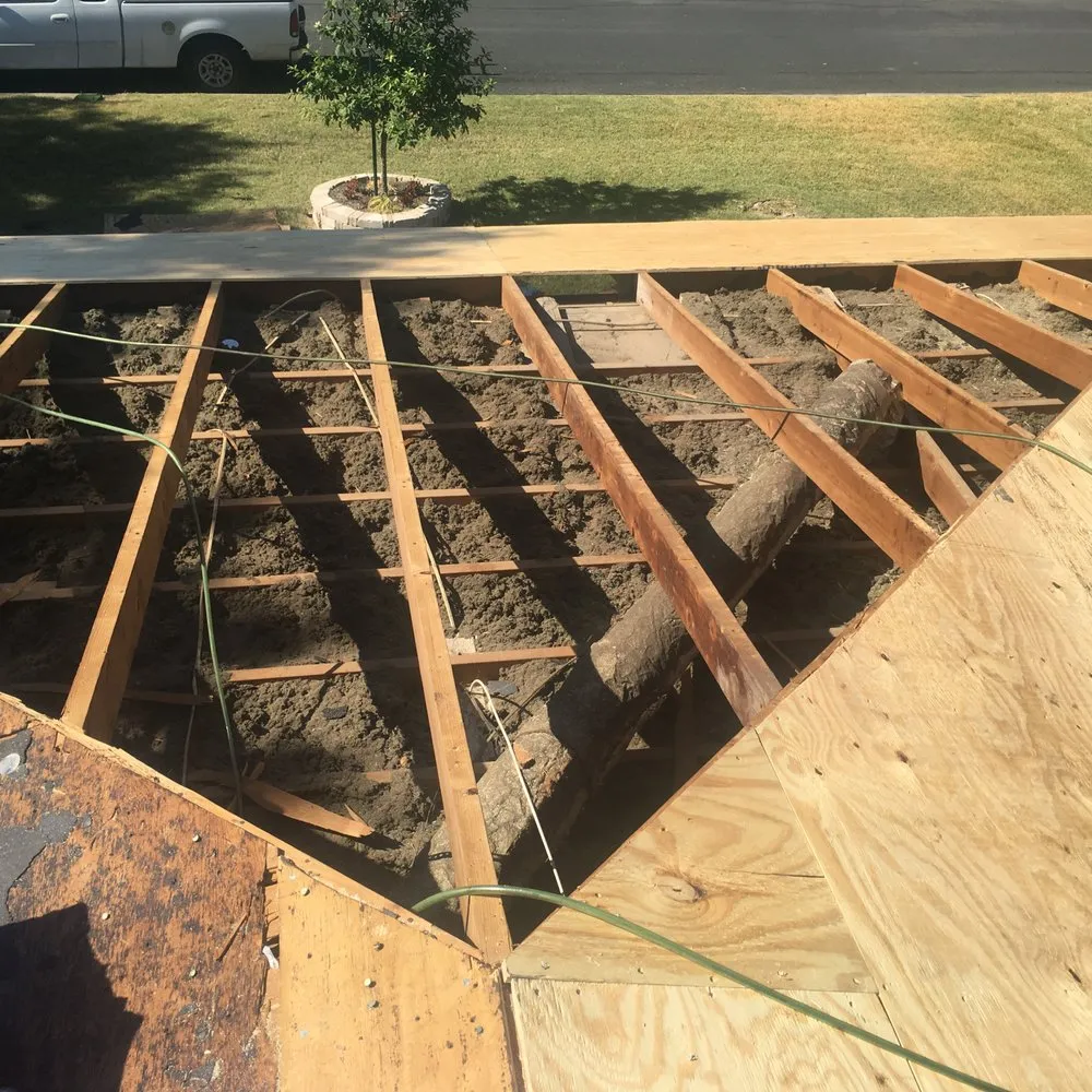 Slide of Mercedes Roofing