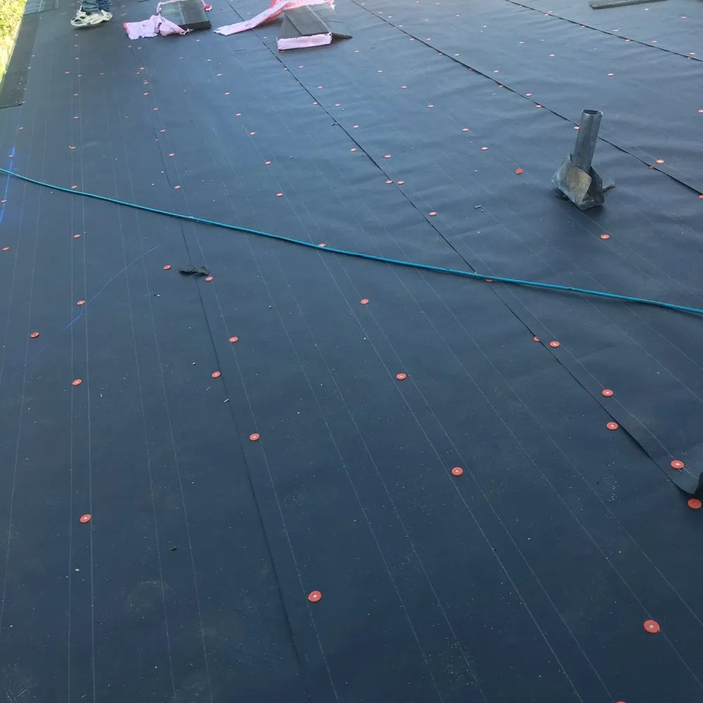 Slide of Mercedes Roofing