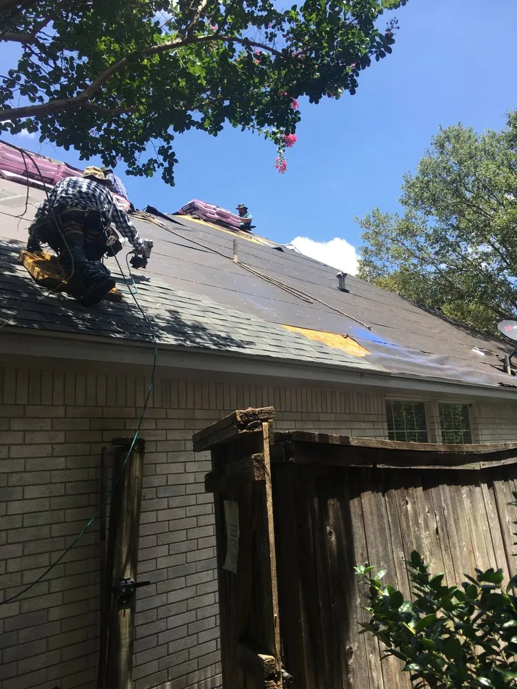 Slide of Mercedes Roofing