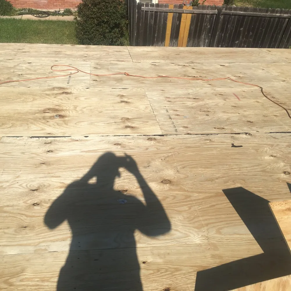 Slide of Mercedes Roofing