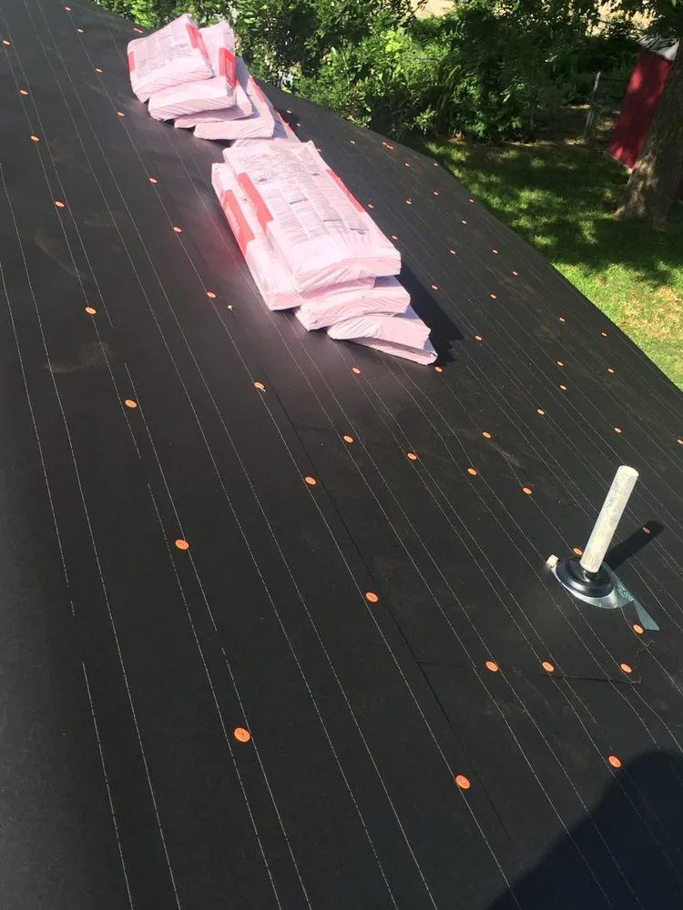 Slide of Mercedes Roofing