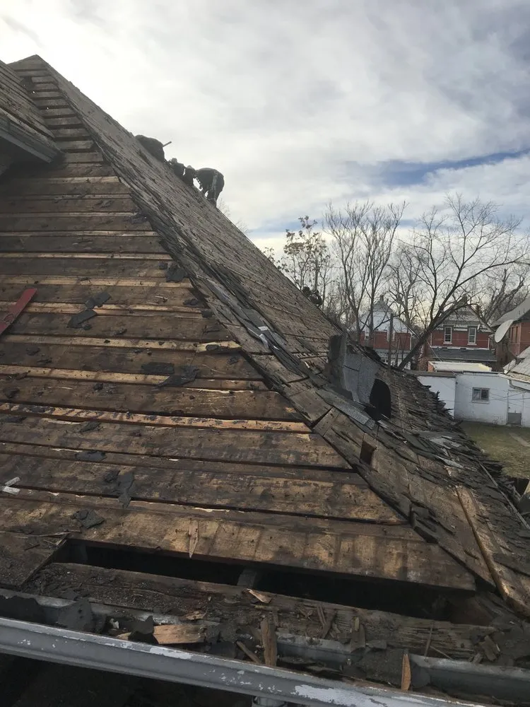 Slide of Mercedes Roofing