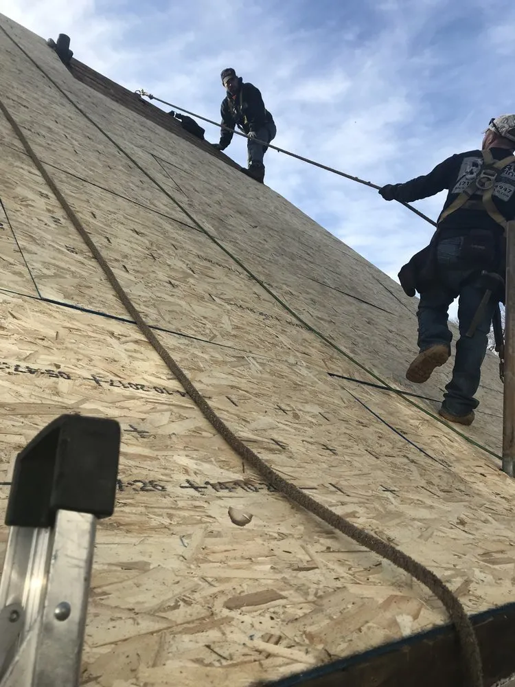 Slide of Mercedes Roofing